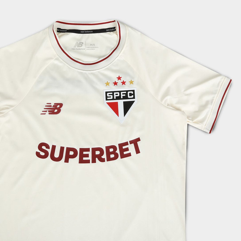 Camisa São Paulo Comemorativa 26/27 Torcedor New Balance Feminina Off White 39V-264J-701